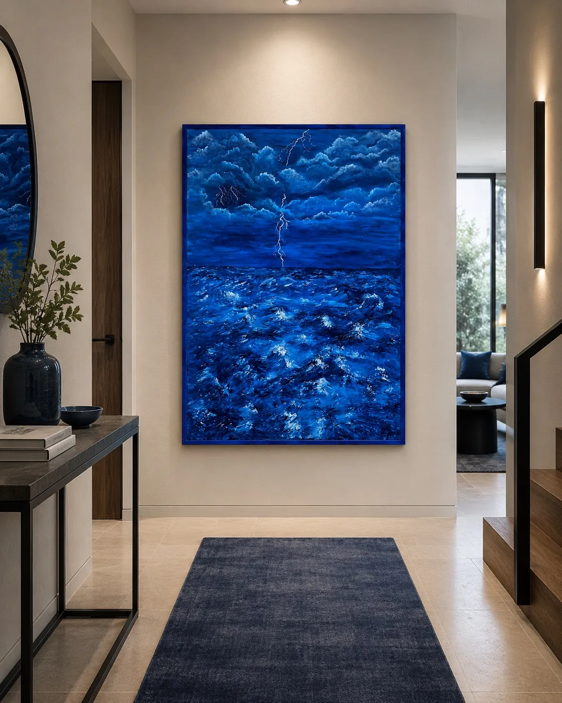 Grande toile bleue sur mesure dans une entrée épurée, art et architecture d'intérieur, Nasseta Studio Genève